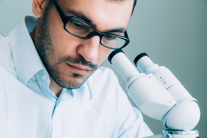 Pathologist_with_Microscope.jpg